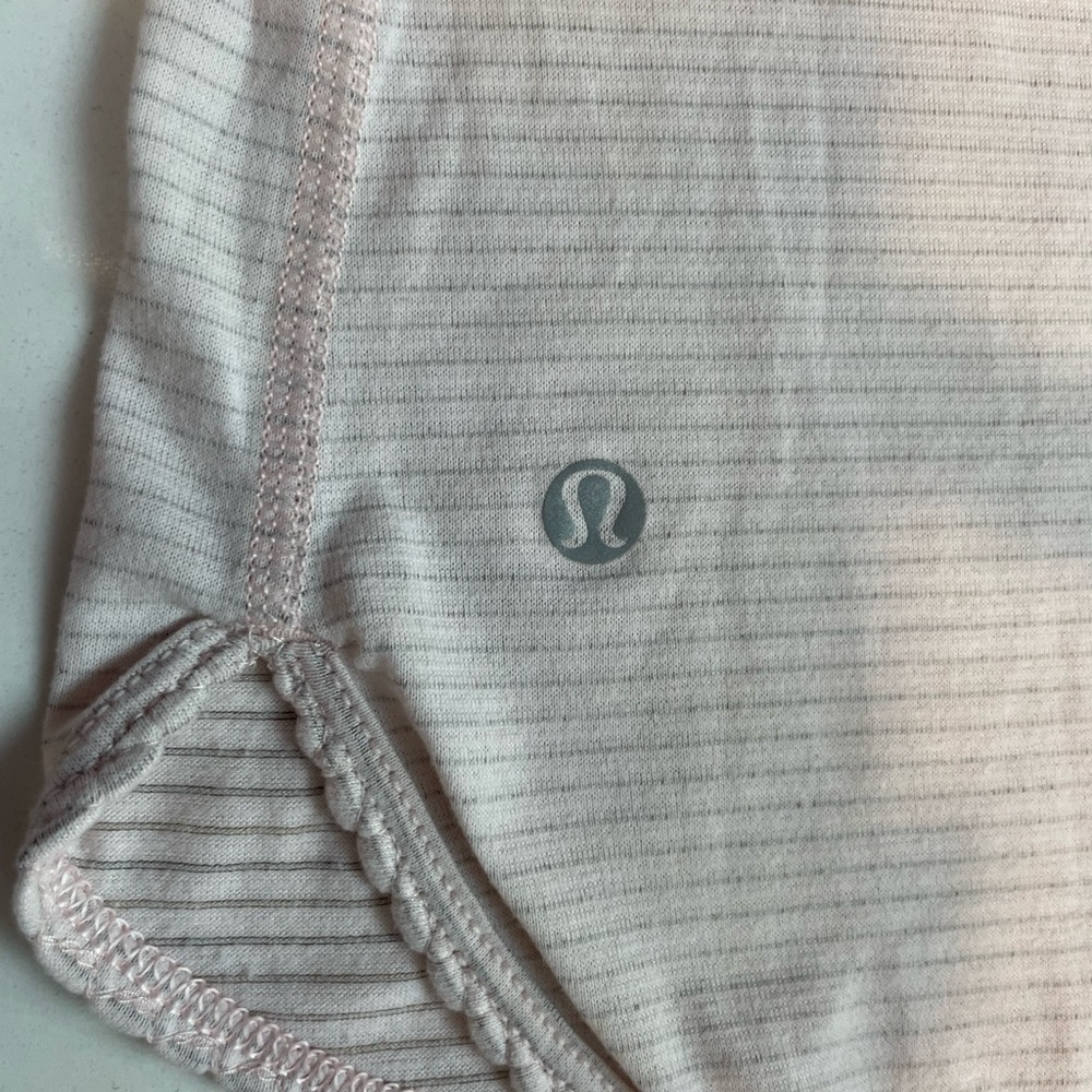 Lulu lemon tank top soft pink. Pre loved